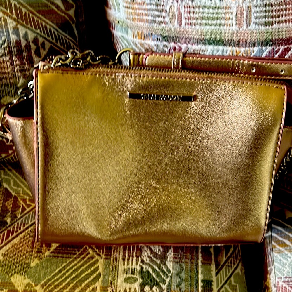 Gold cross purse it really fits a lot